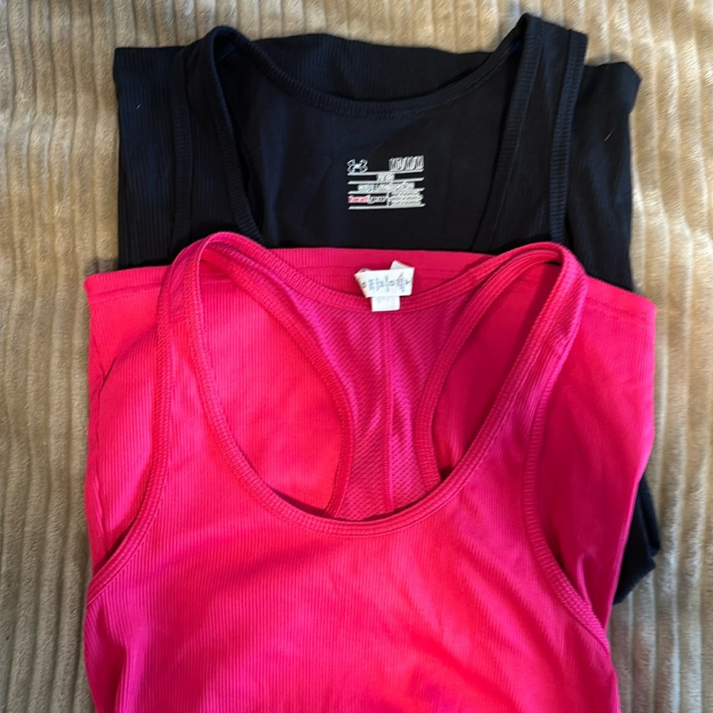 Under Armour tank tops.